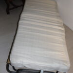 Lit d'appoint pliable sur roulette