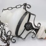 Suspension en verre et métal