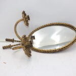 Miroir doré avec chandelier