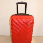 Valise à coque rouge